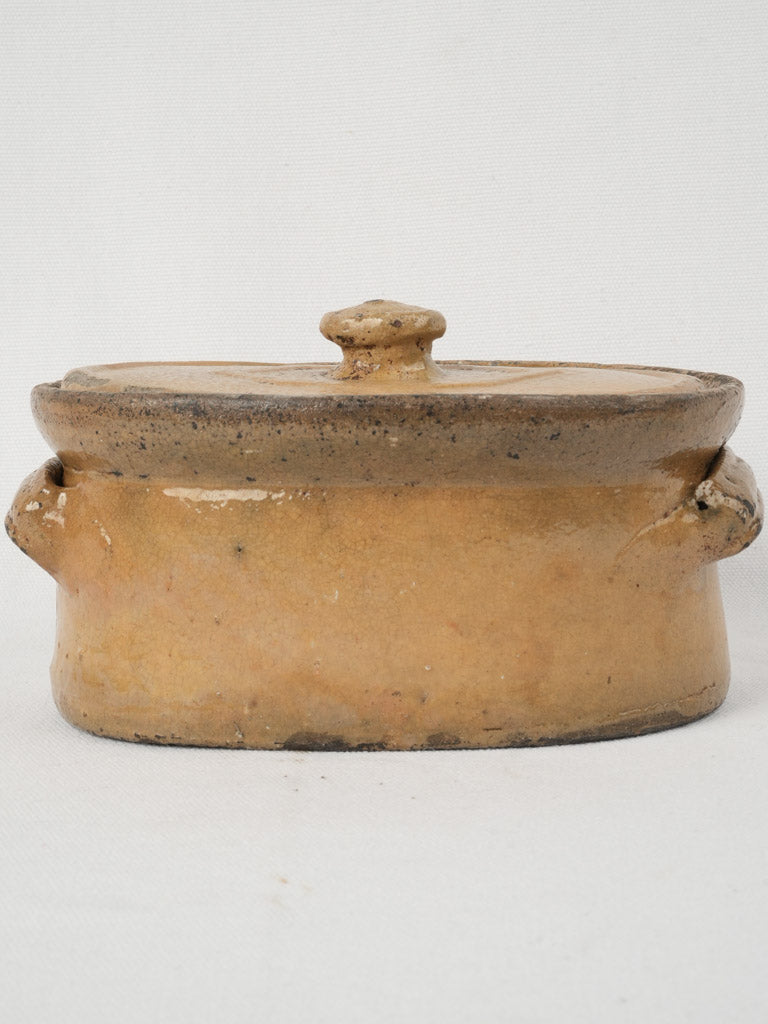 Ornate 19th-century yellow ocher tureen