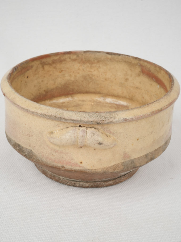 Antique cream-glazed French terracotta bowl