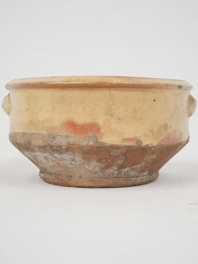 Time-worn terracotta country-style bowl