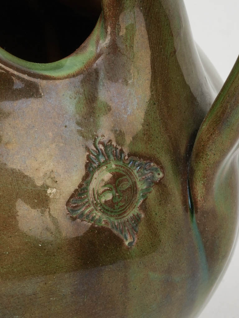 Distinctive pinched-spout green pitcher