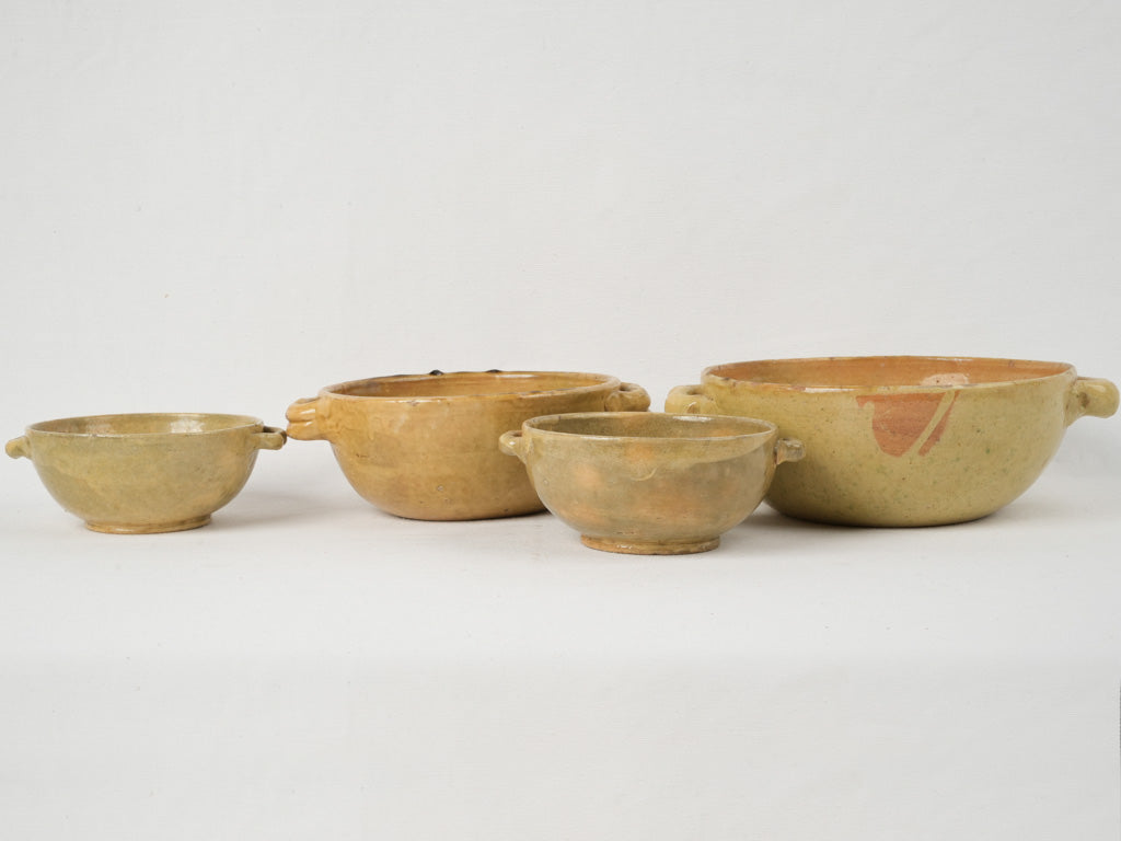 Classic French yellow-glazed ceramic bowls