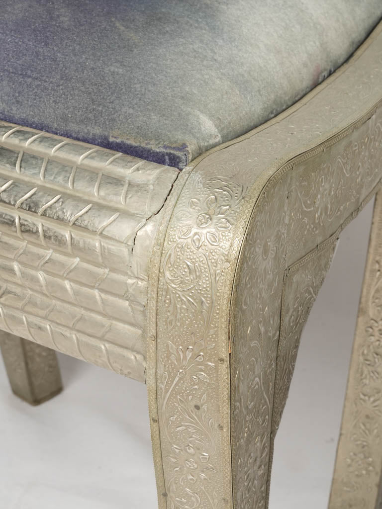 Gleaming silver metallic stool design