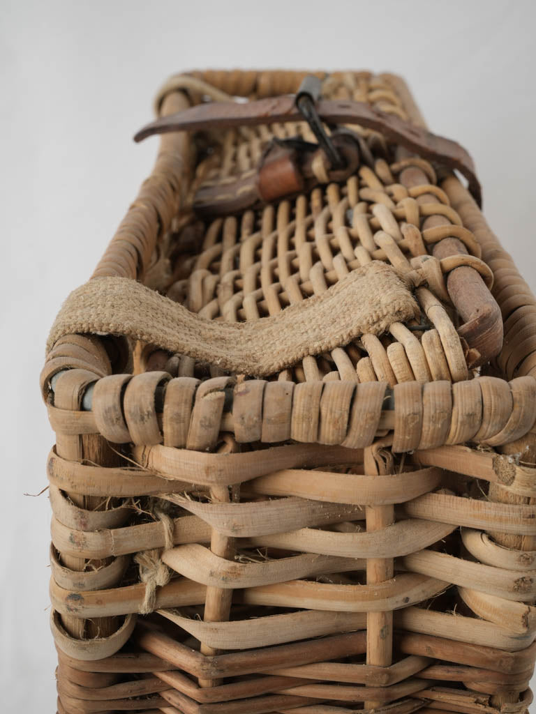 Heavy antique wicker bottle carrier