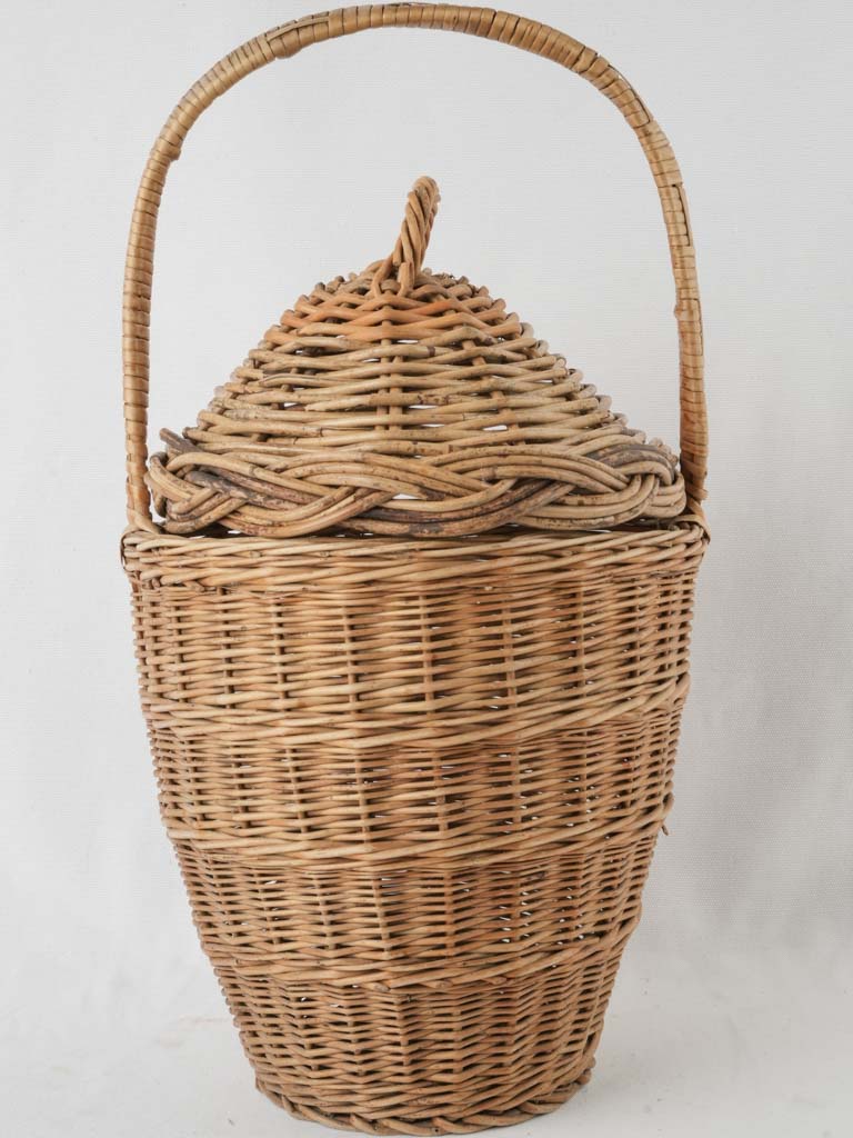 Aged, French lidded wicker hamper