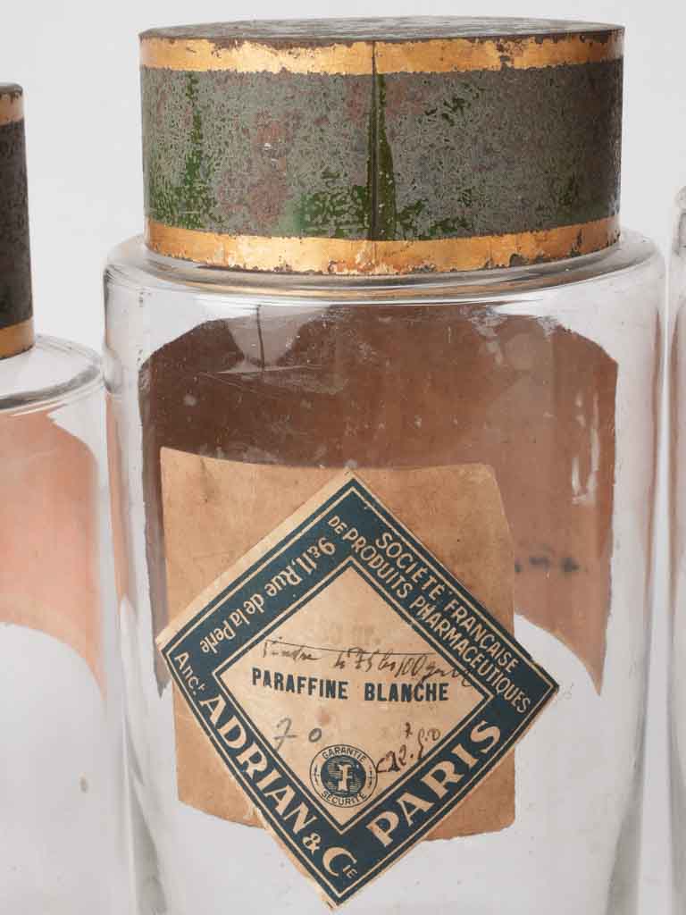 Vintage French orange-labeled medicine jars