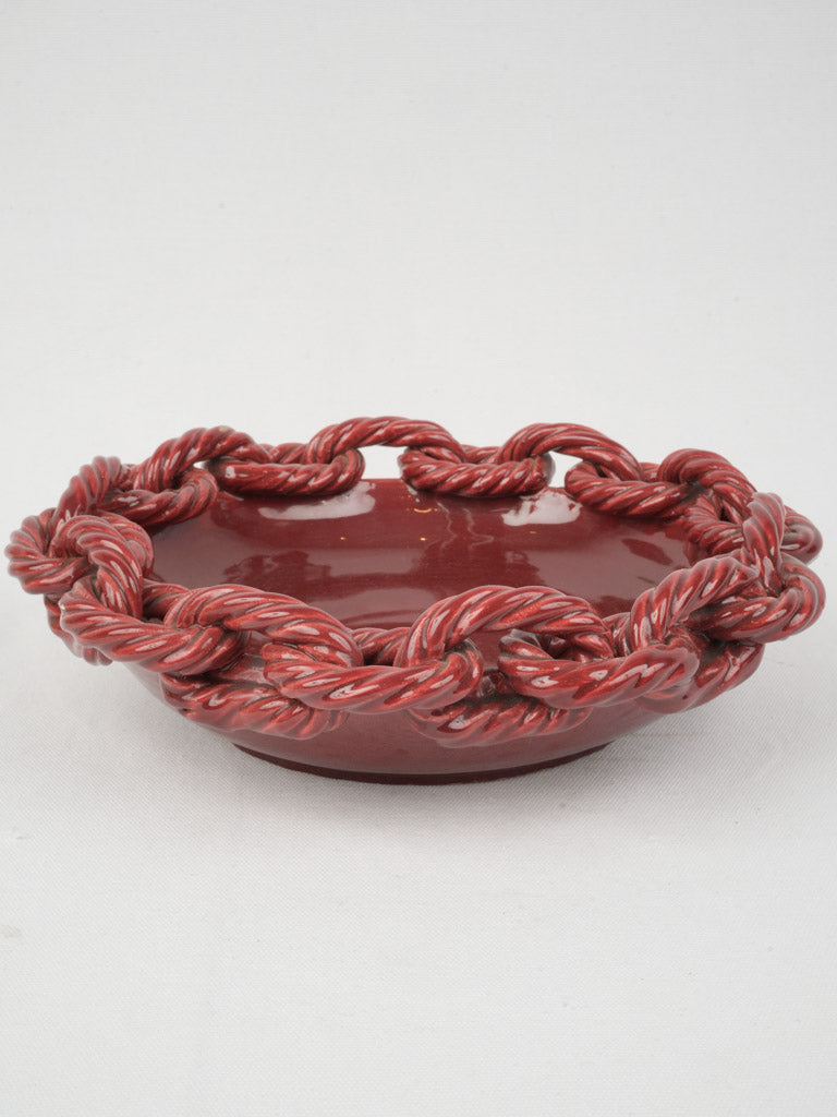 Intricately detailed red ceramic centerpiece