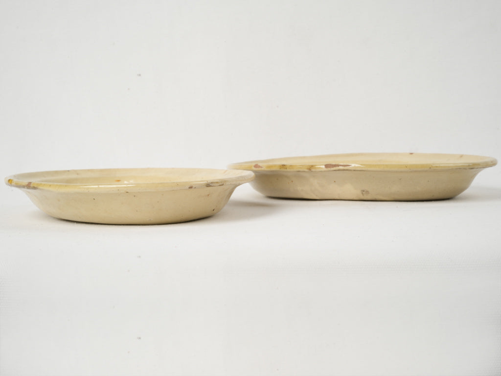 Finely crafted aged yellow-glazed platters