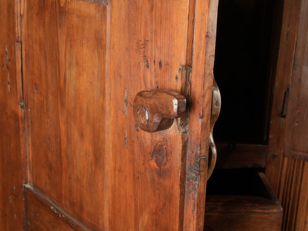 Artisanal carved pine candle cabinet  