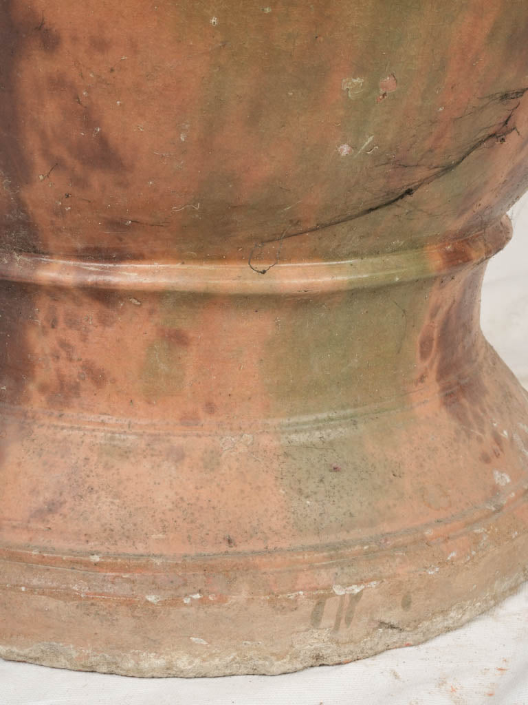 Rich patina terracotta urn