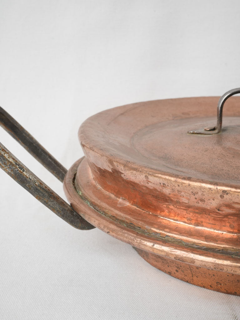 Aged, steaming copper pot