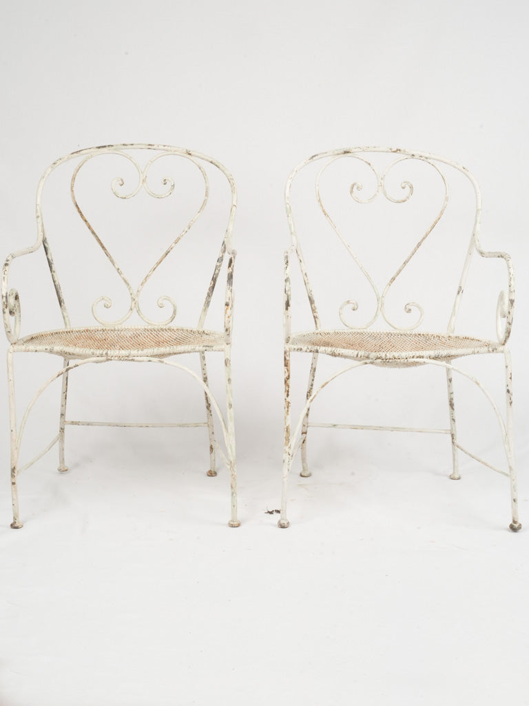 Rustic, timeless wrought iron armchairs