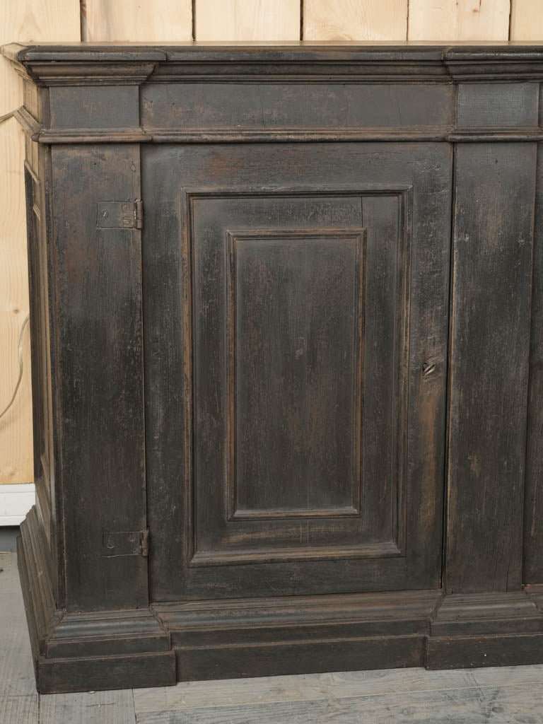 Old Italian wooden doric-style cabinets