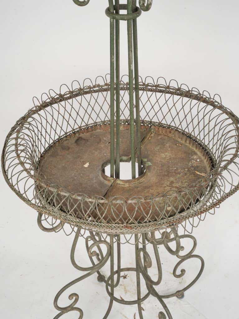 Intricate antique two-tiered plant holder