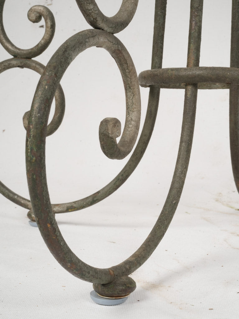 Aged decorative wrought iron stand