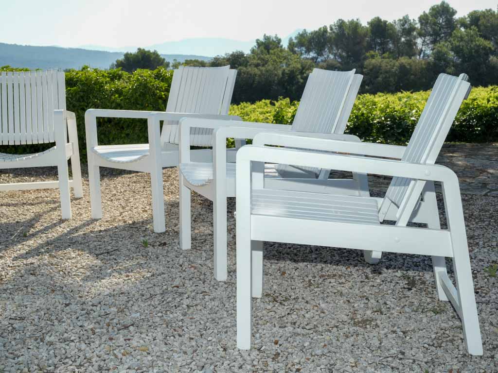 Rustic wooden slatted garden armchairs