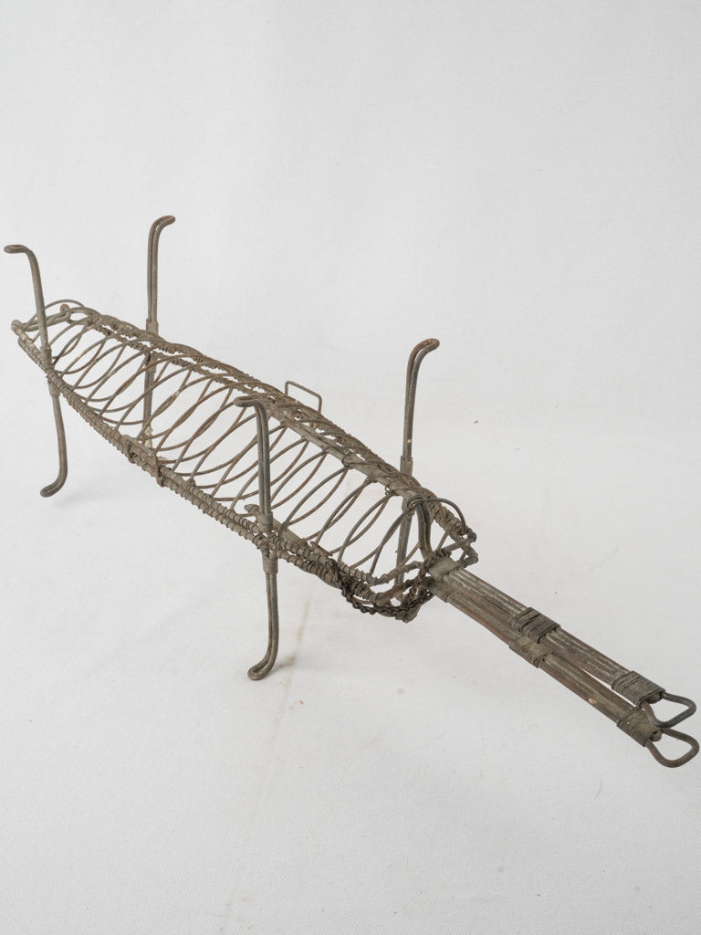 Unique antique fish grilling basket