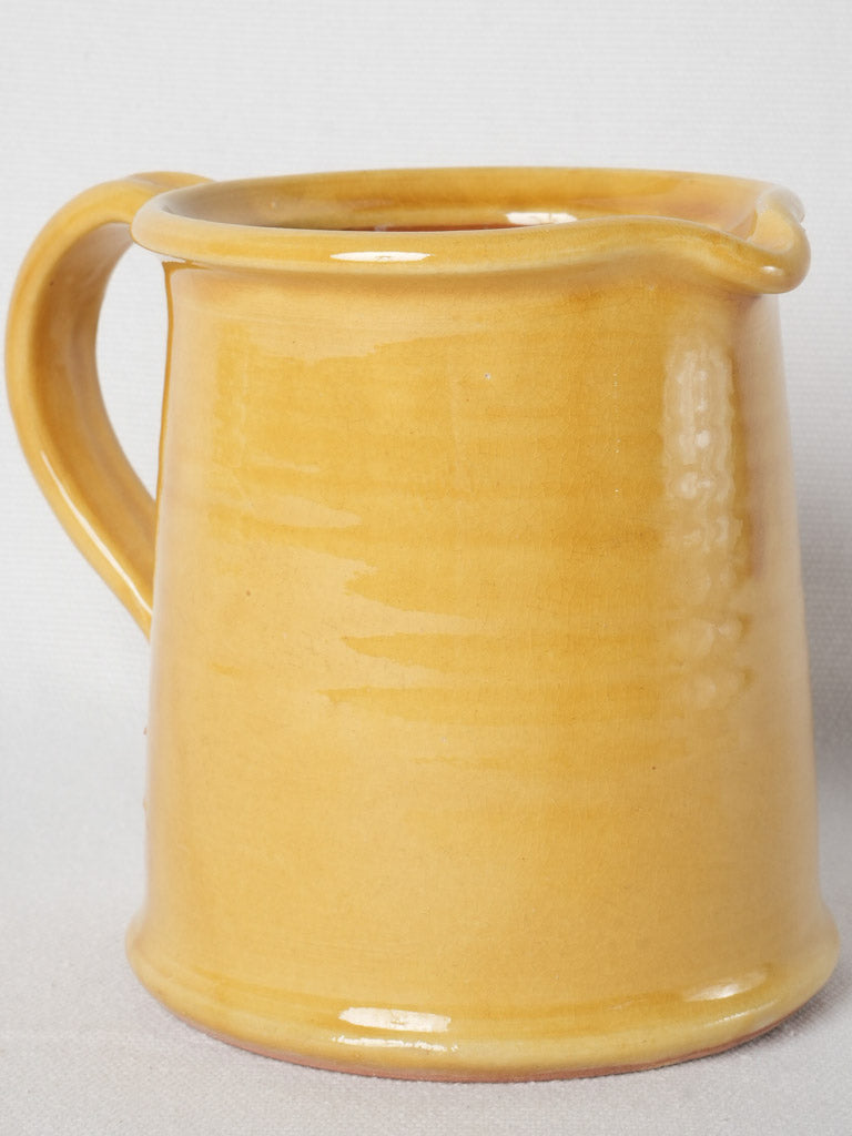 Vintage ocher-glazed terracotta Ravel pitcher