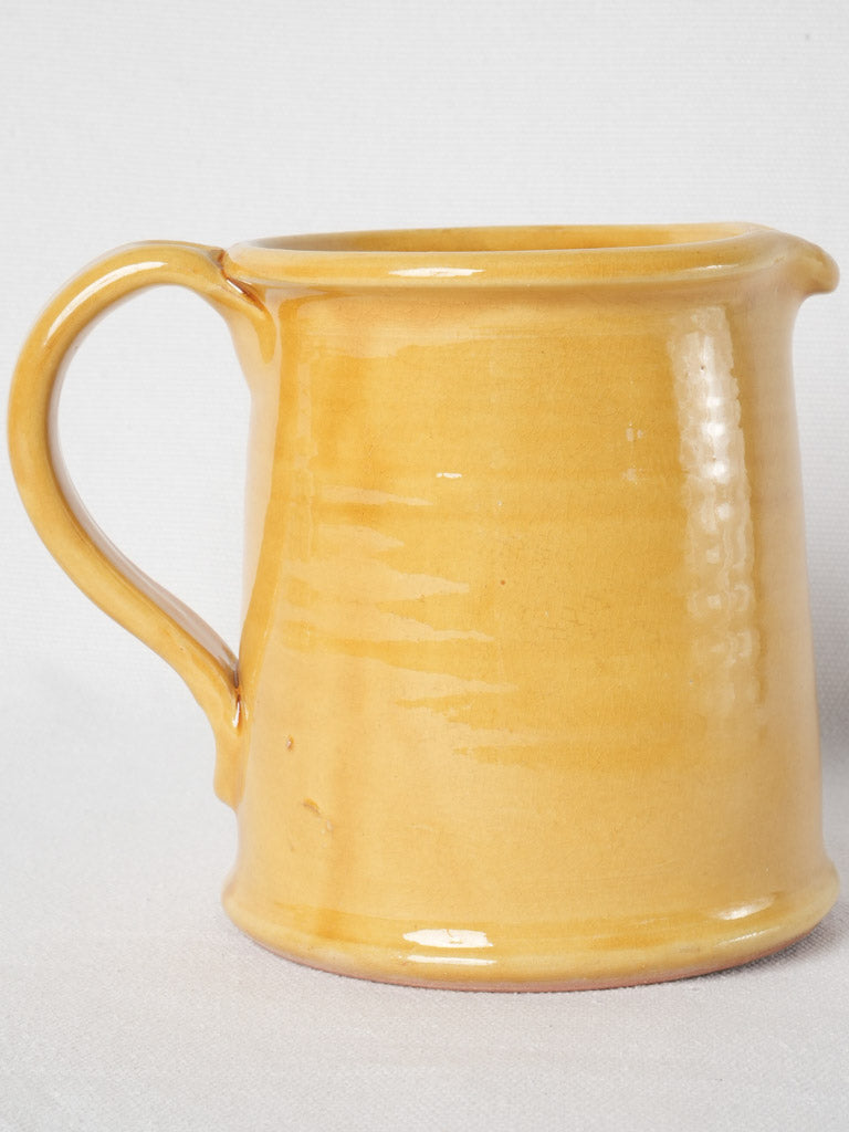 Artisanal ocher-glazed terracotta Ravel pitcher