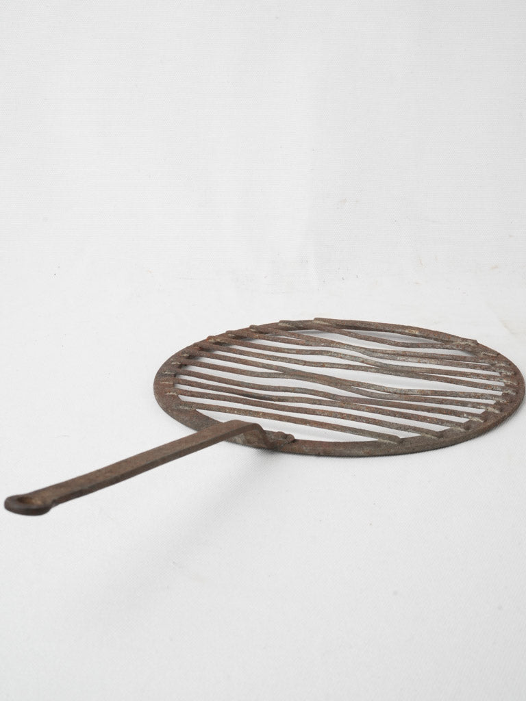 Vintage, aged round oven grate