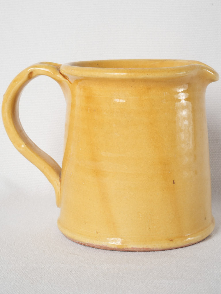 Charming ocher terracotta water jug