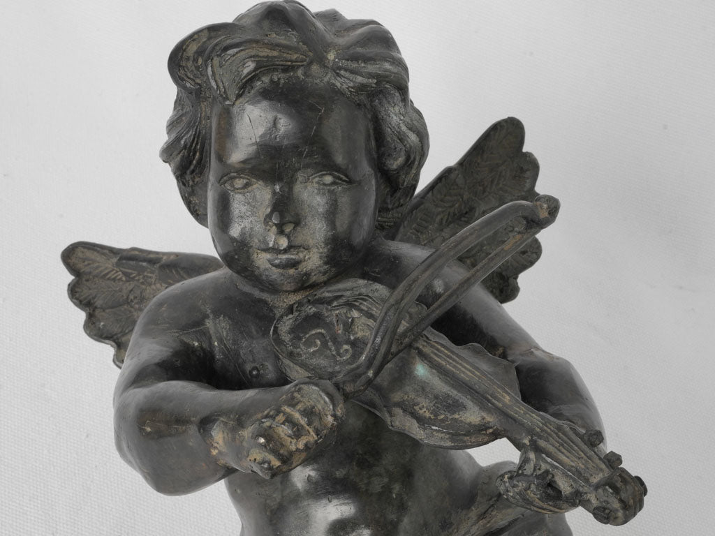 Delightful 19th century winged cherub sculpture