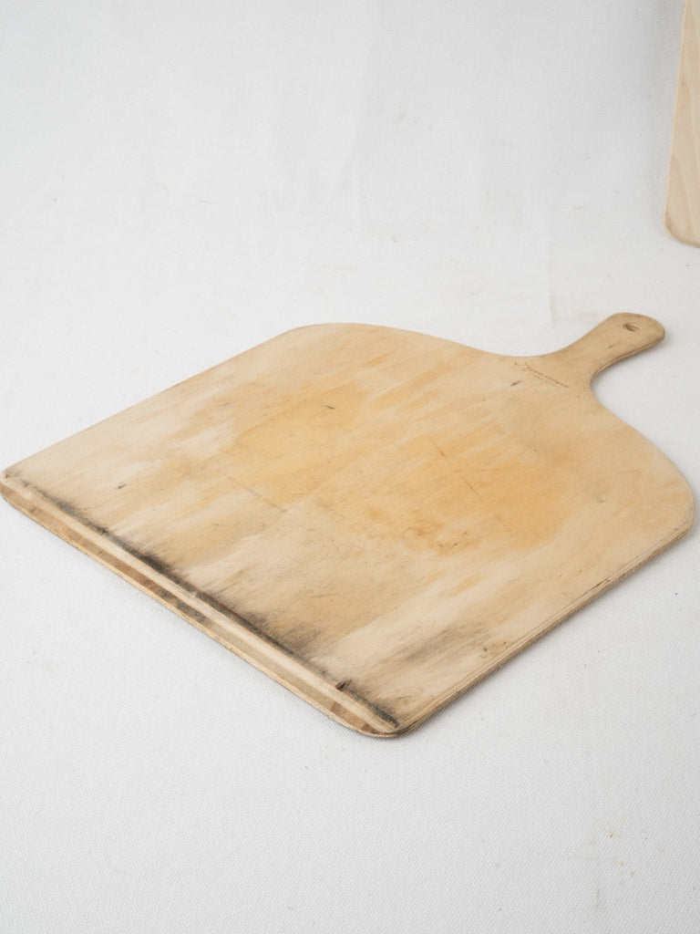 Vintage shovel-shaped wooden pizza trays