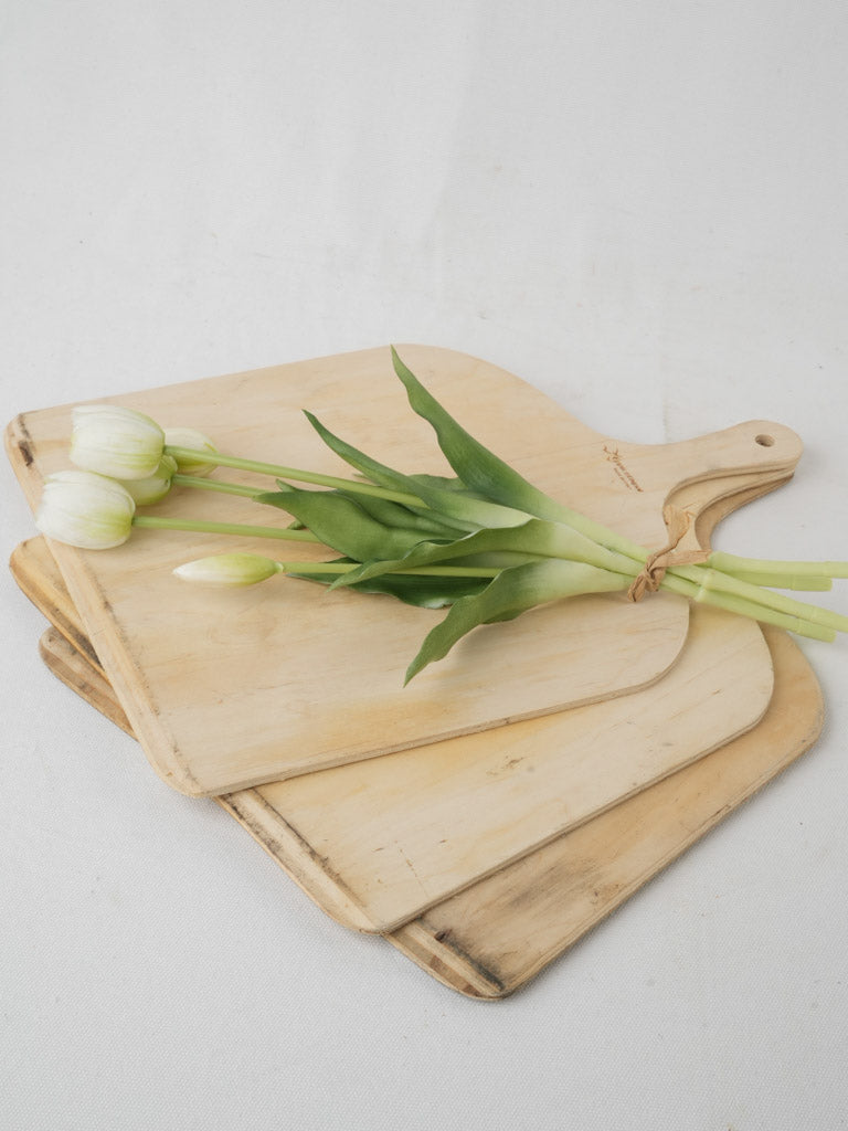 Aged shovel-shaped wooden pizza trays