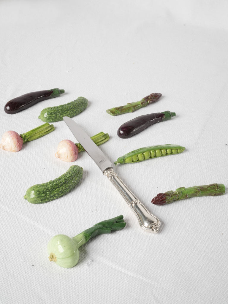 Artisanal vegetable-themed ceramic knife rests