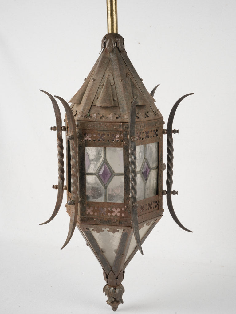 Intricate craftsmanship iron and glass lantern