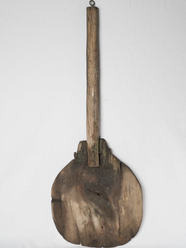 Aged historic kitchen decorative paddle