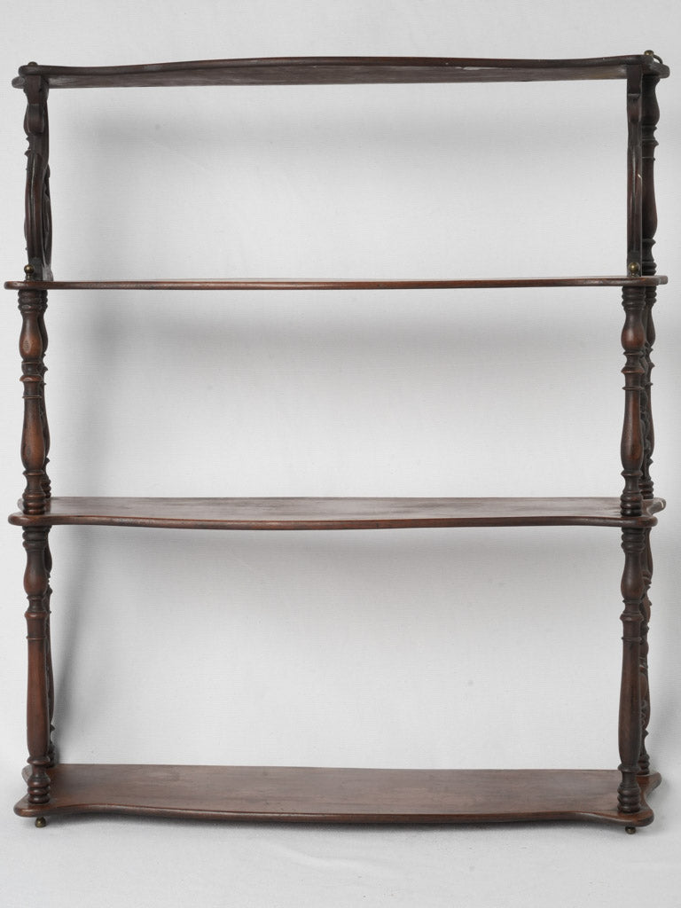 Antique bow-front French craftsmanship shelves