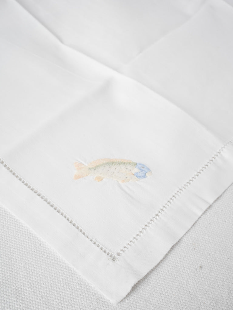 Exquisite, timeless, fish-embellished hemstitched napkins