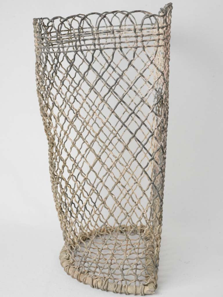 Rustic woven metal outdoor garbage holder