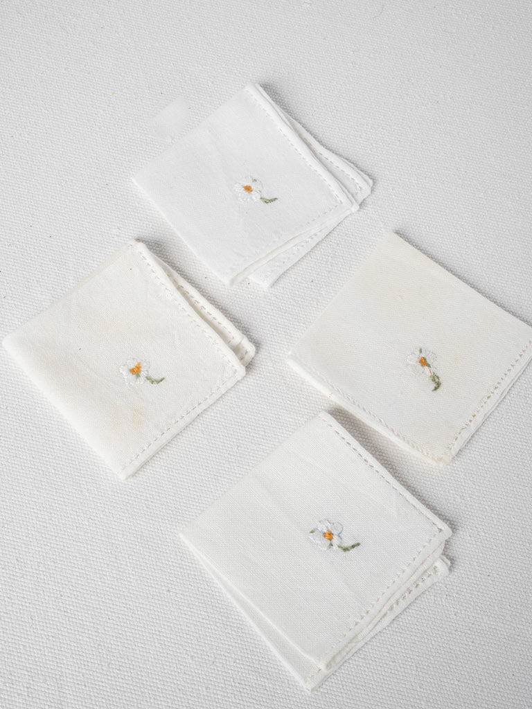 Vintage white flower-embroidered serviettes