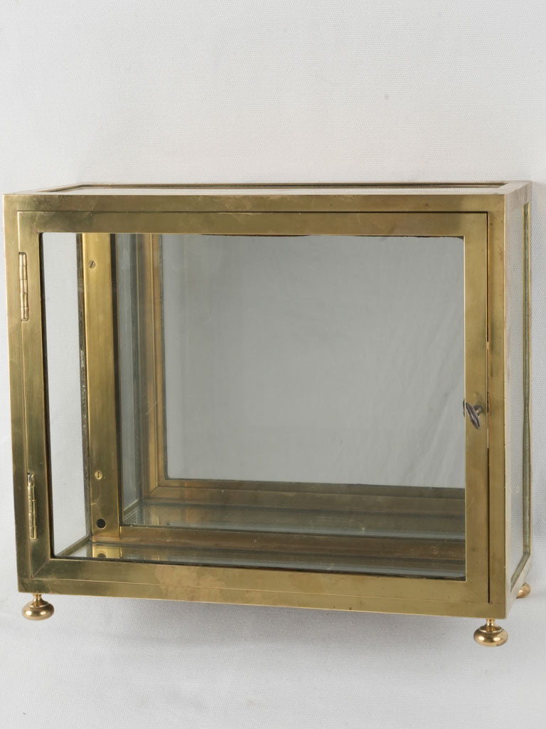 Antique brass mirrored jewelry display case