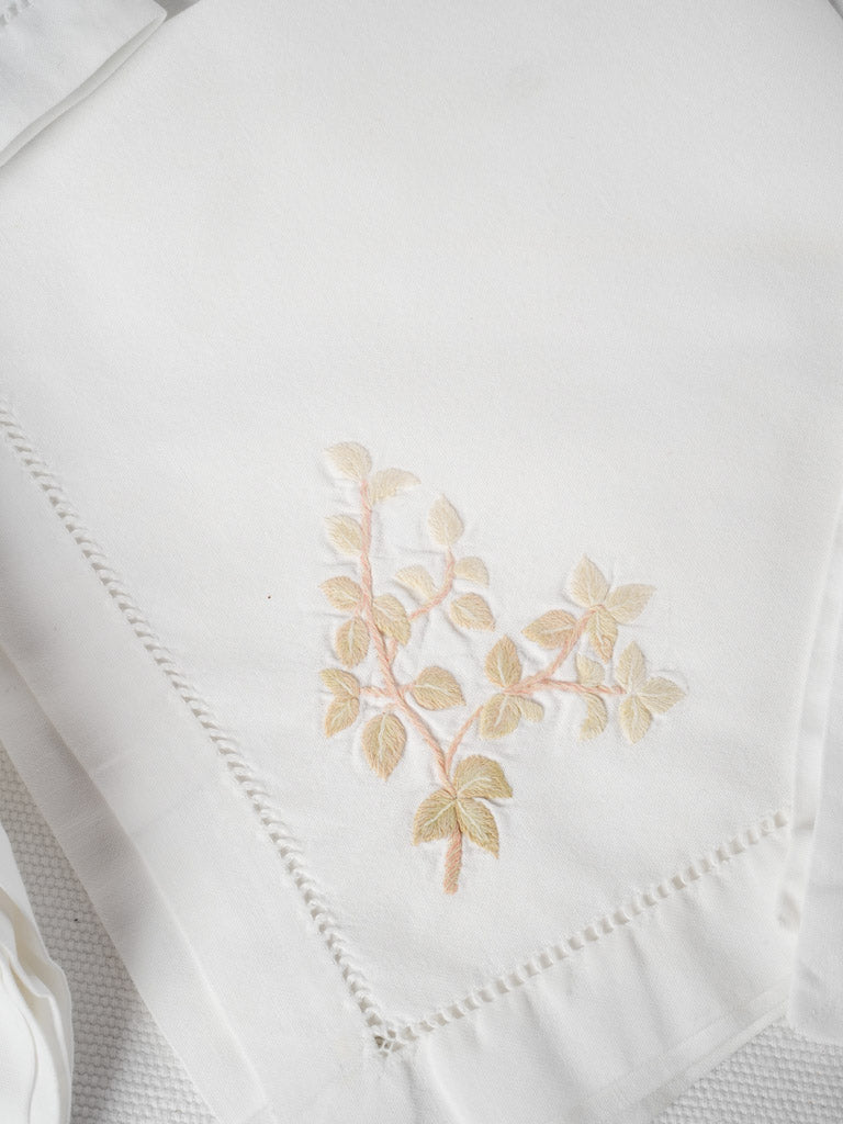 Handcrafted linen napkins with foliage motifs