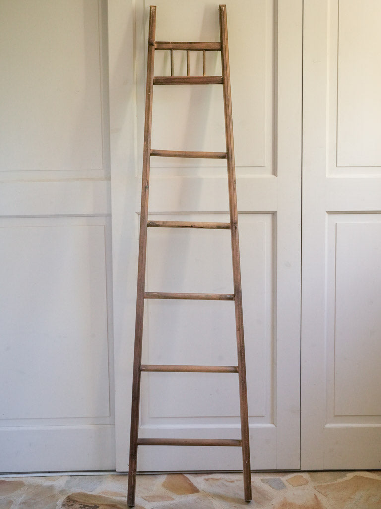 Antique wooden ladder for towels