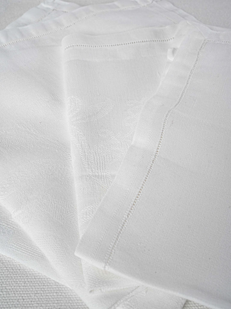 Artisan-crafted, foliage-embroidered linen napkins