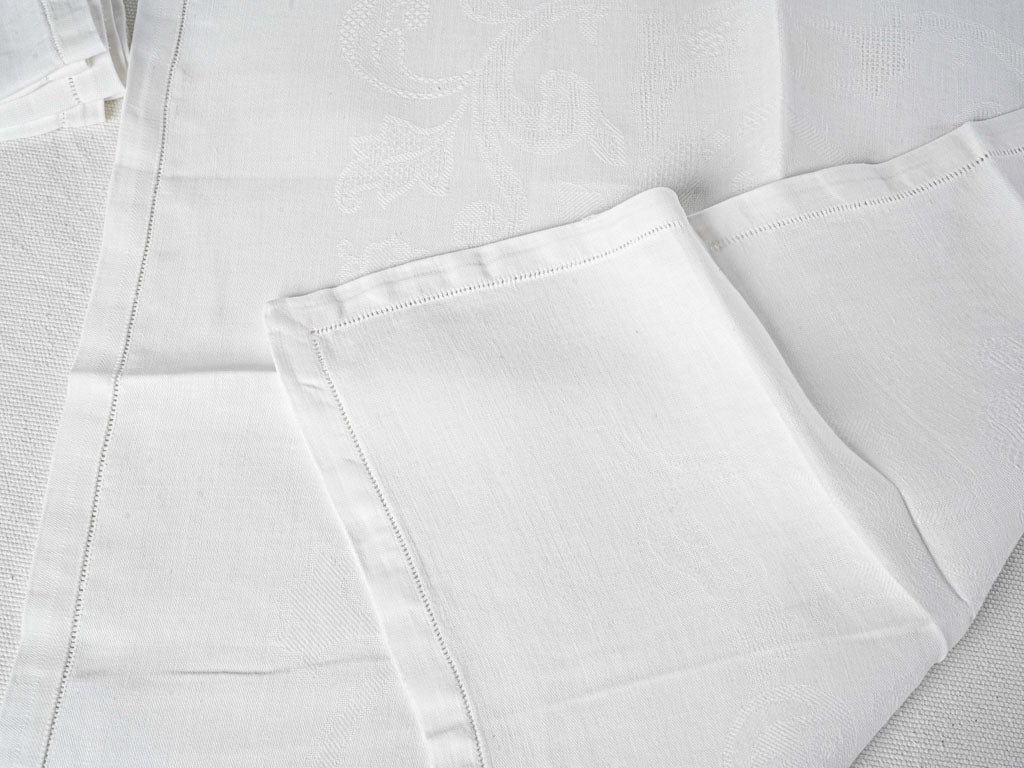 Delicate, hemstitched napkins with foliage embroidery