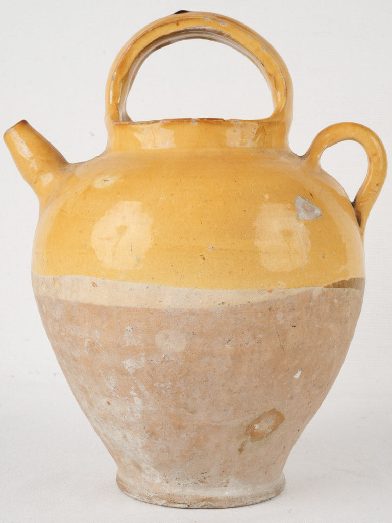 Elegant two-handled clay container  