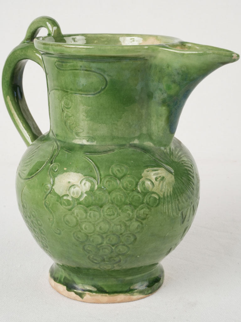 Antique embossed grapevine jug