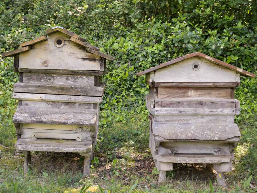 Aged, authentic, wooden French beehives