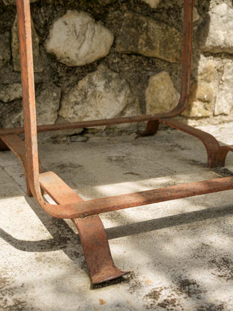 Weathered iron patio dining table