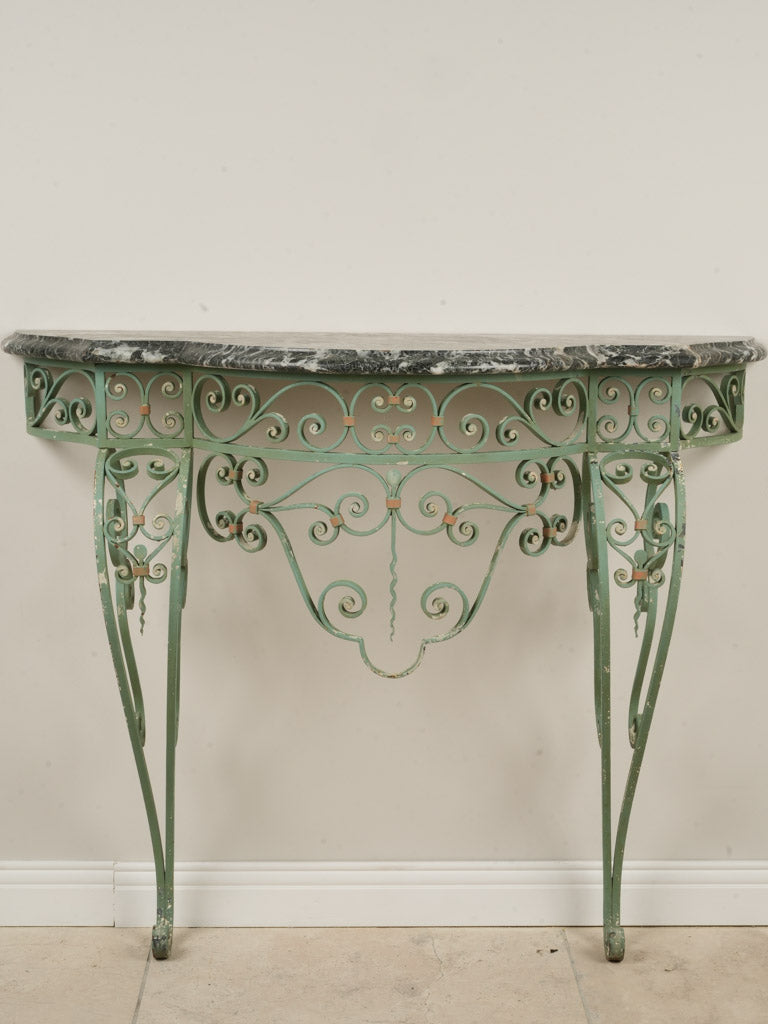 Intricate wrought iron base console