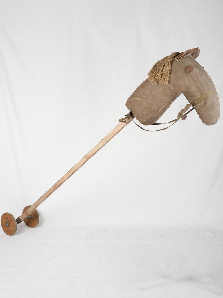 Rustic hemp-haired horse head with wheels