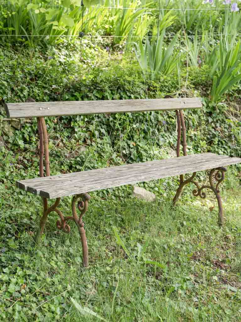 Charming, rustic slatted wood garden seating