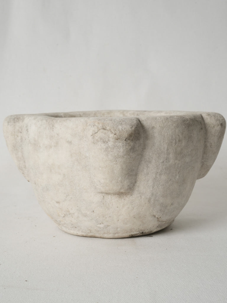 Aged white marble kitchen pestle