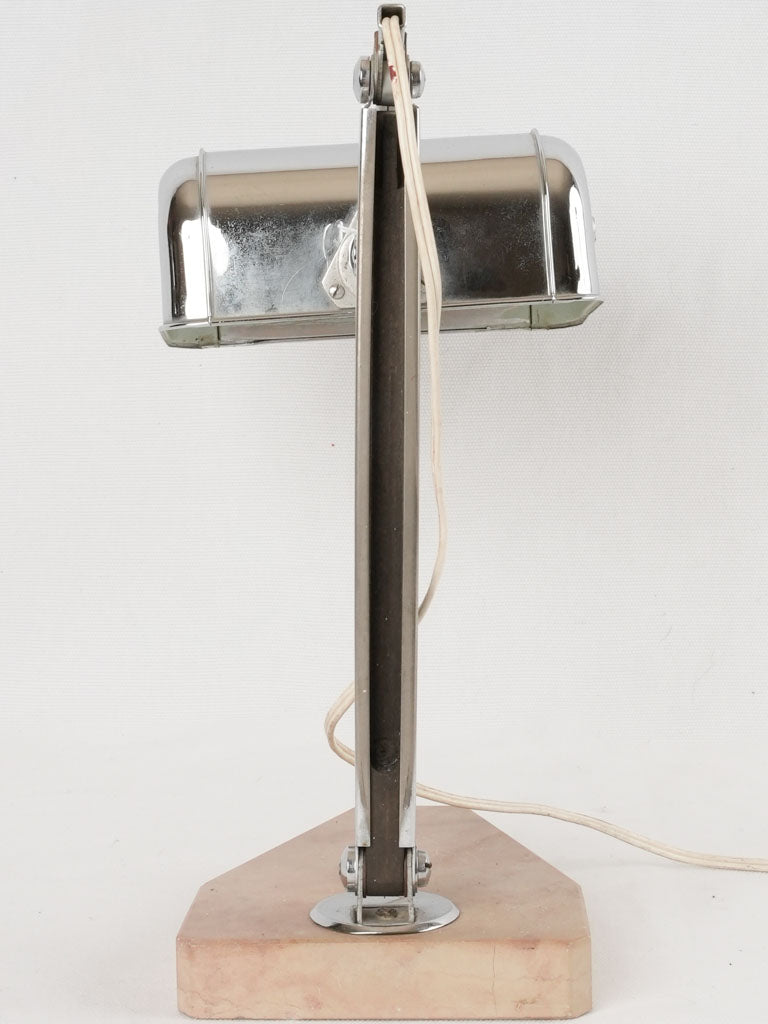 Timeless triple-jointed chrome table light