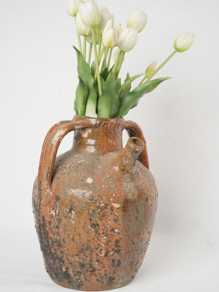 Rustic French walnut oil jar  