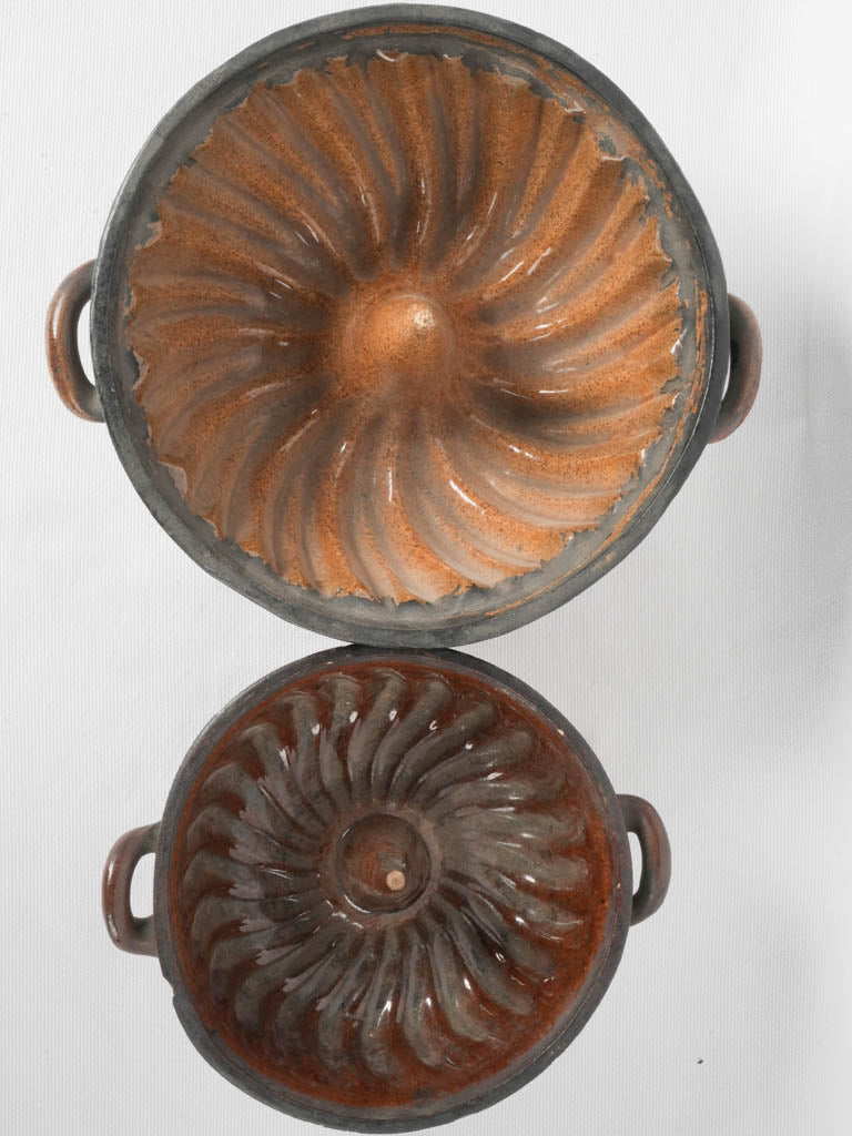 Two antique French sandstone bundt pans